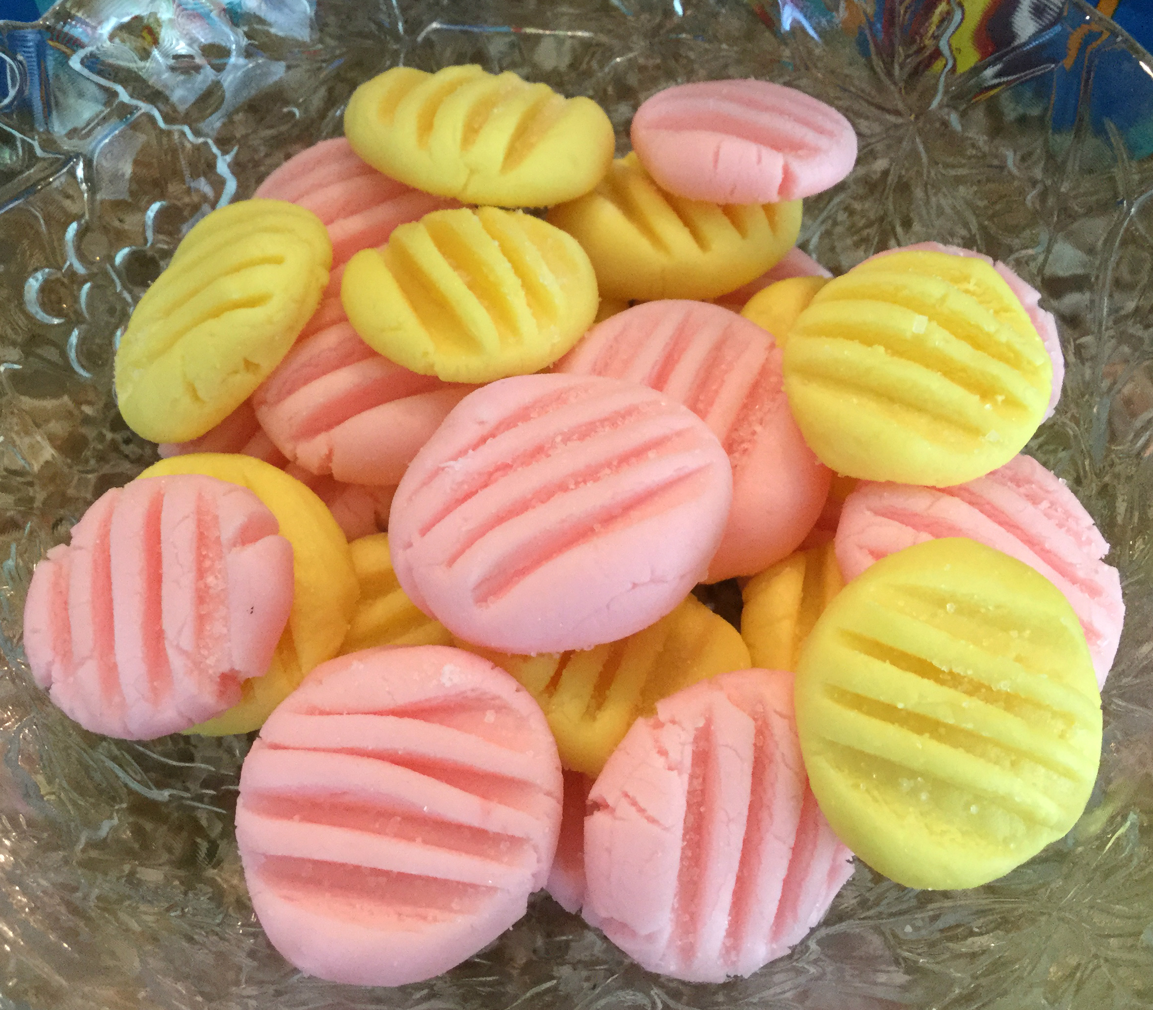 bowl of pink and yellow candies