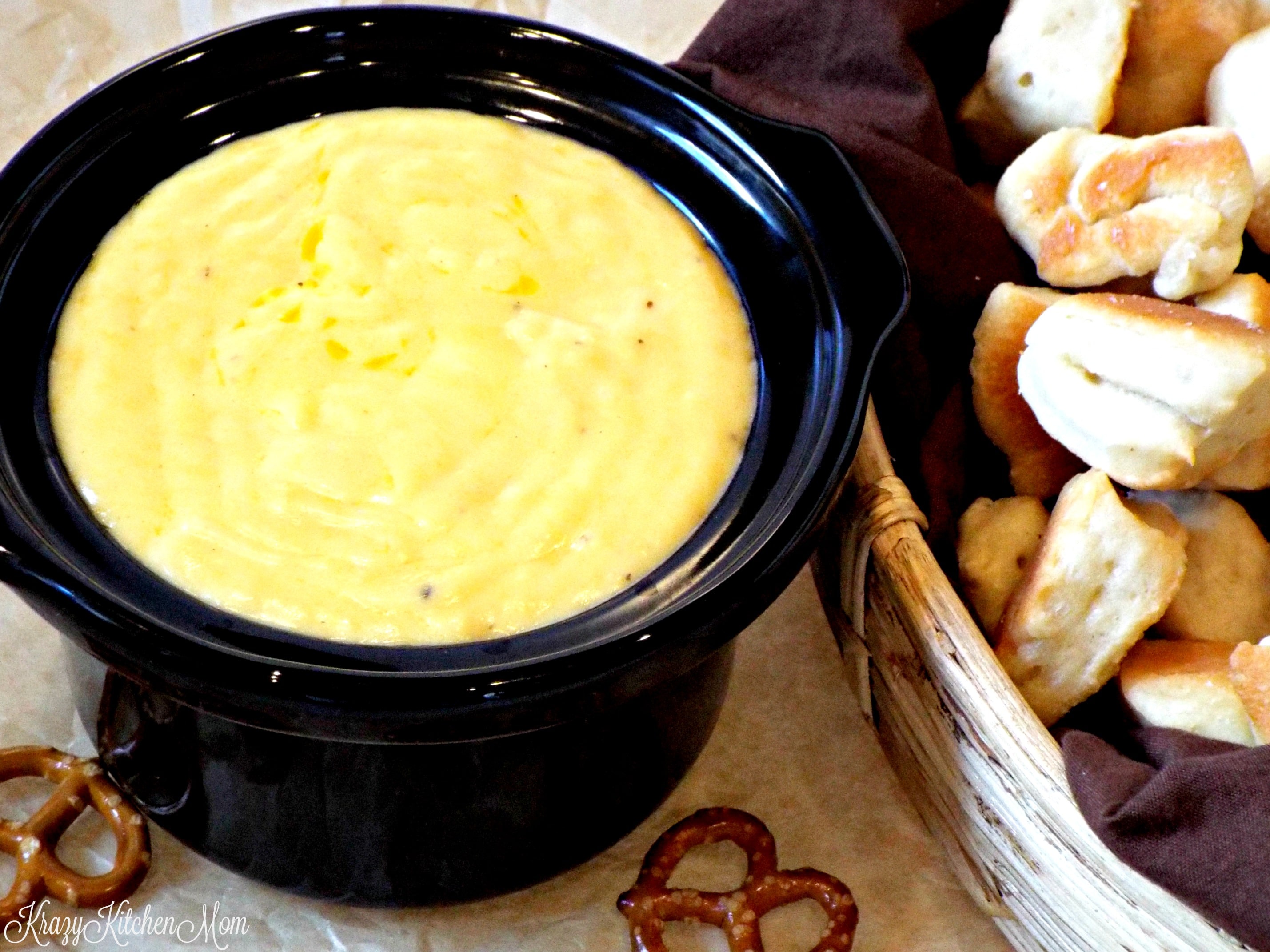 crockpot filled wit cheese sauce