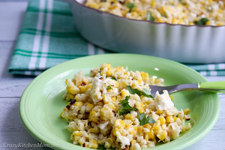 Mexican Street corn on a plate with fork