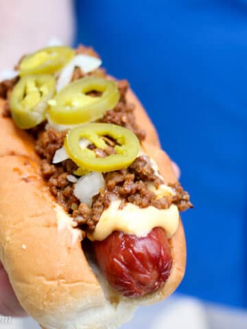 Man holding a Classic Coney Island Hot Dog