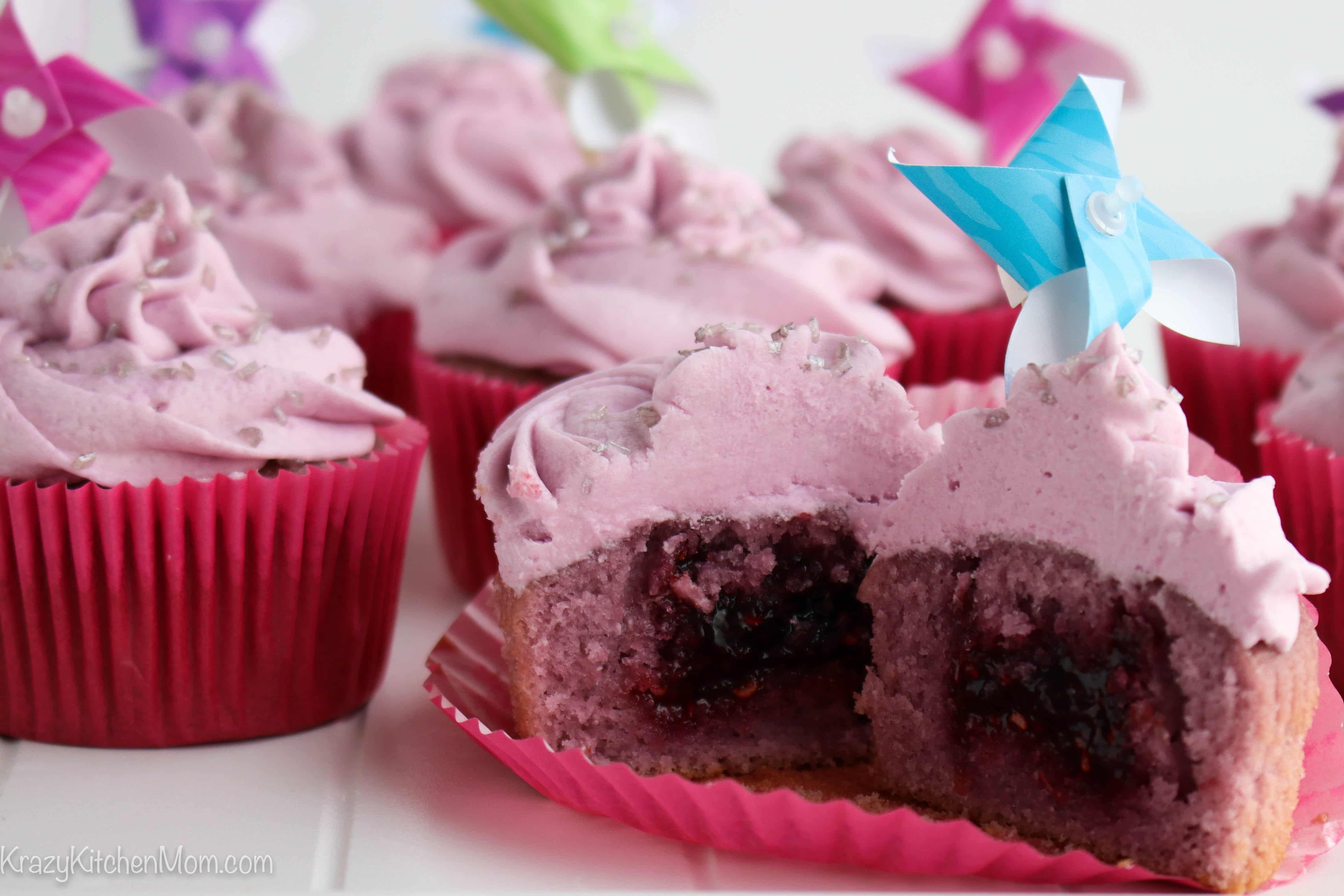 Red Sangria Cupcakes with Raspberry Filling cut in half
