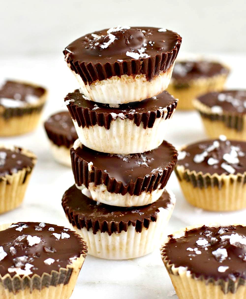 a stack of four round almond joy candies 