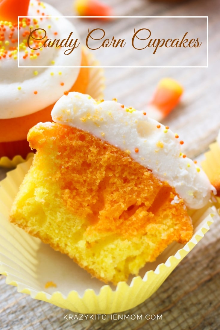 Candy Corn Cupcakes are a fun way to celebrate Halloween and Fall. Just one cake mix, two colors and cream cheese frosting and everyone loves them. via @krazykitchenmom