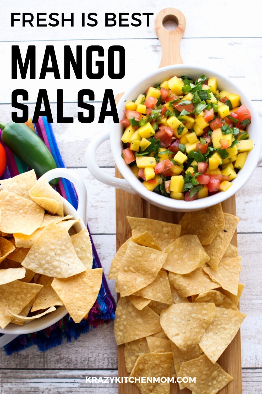 Fresh Mango Salsa is bursting with bright sweet flavor from the perfectly ripened mango and bright red tomatoes with a hint of heat from a jalapeno.  via @krazykitchenmom