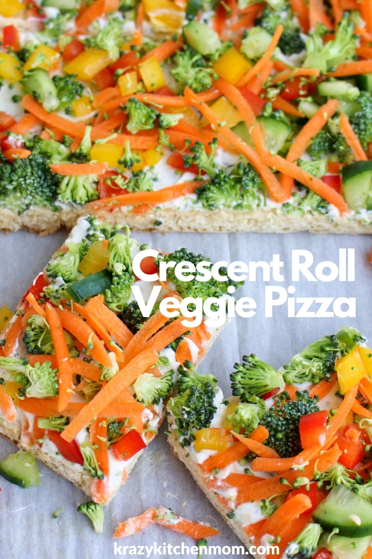 Crescent Roll Veggie Pizza a fresh way to eat veggies. It's made with refrigerator crescent roll dough, homemade dill dip and lots of fresh vegetables. I'd say it's a classic! via @krazykitchenmom