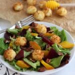 Fried Goat Cheese Balls on a salad