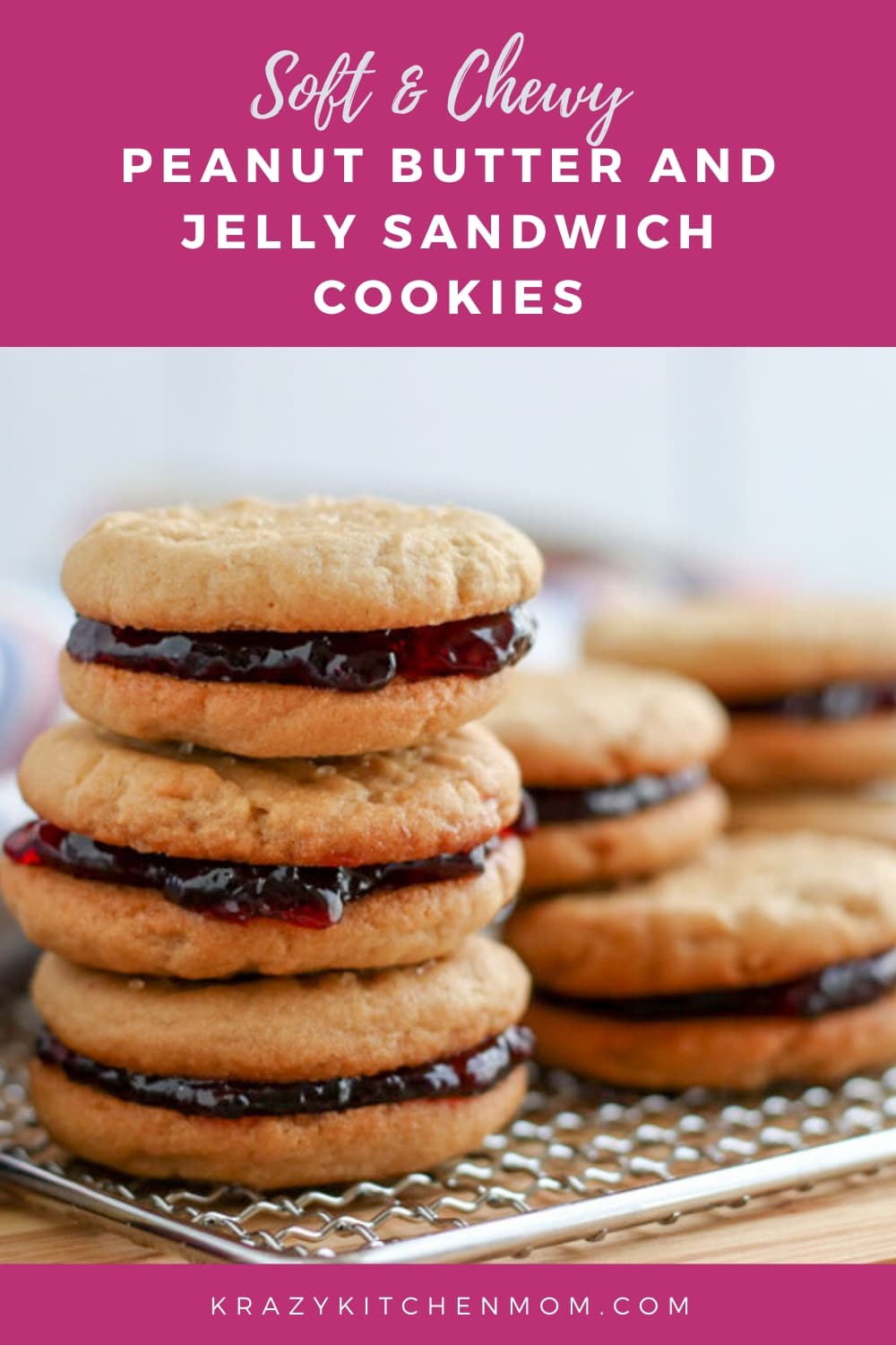 Two peanut butter cookies sandwiched together with grape jelly make the best Peanut Butter and Jelly Sandwich Cookies. via @krazykitchenmom