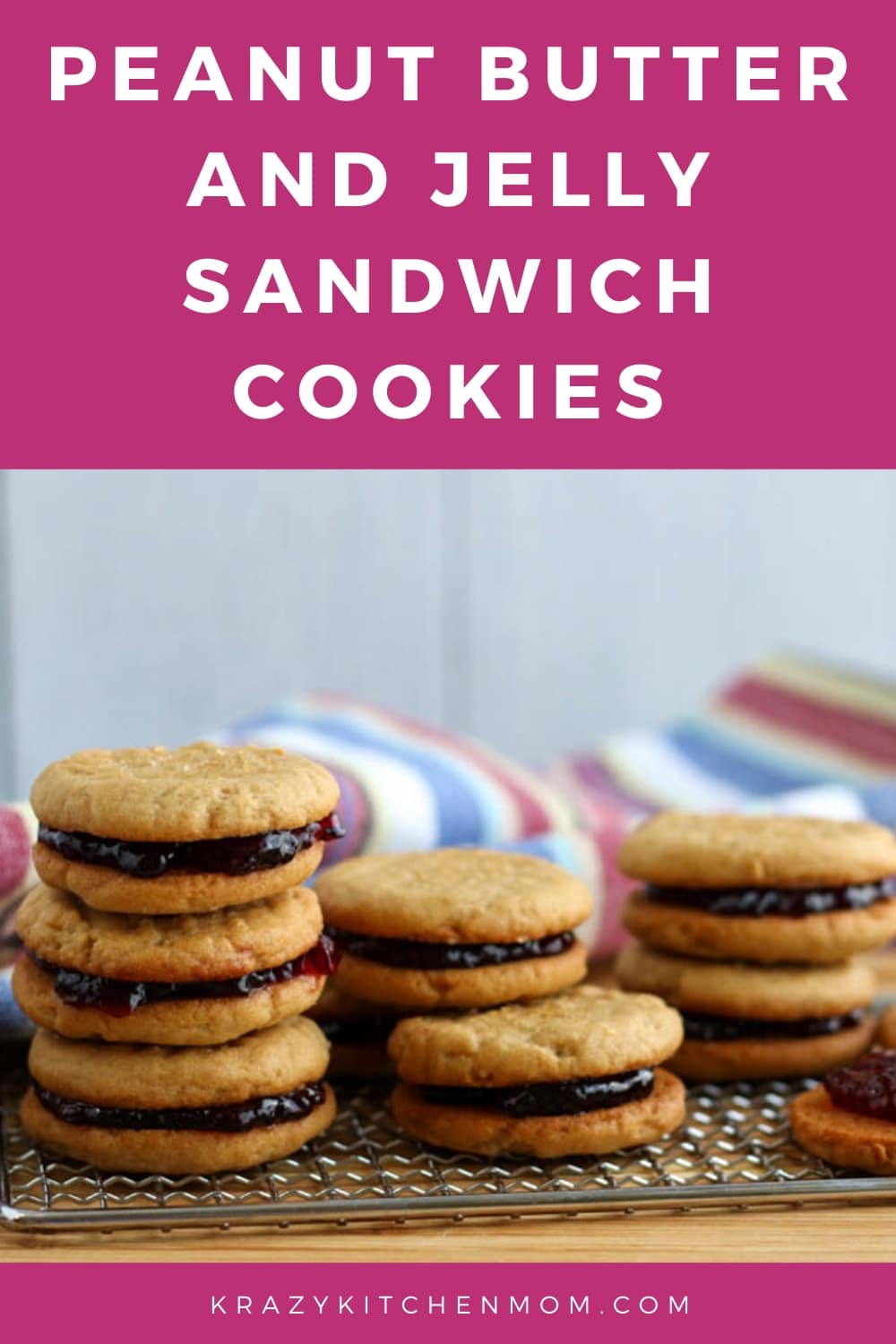 Two peanut butter cookies sandwiched together with grape jelly make the best Peanut Butter and Jelly Sandwich Cookies. via @krazykitchenmom