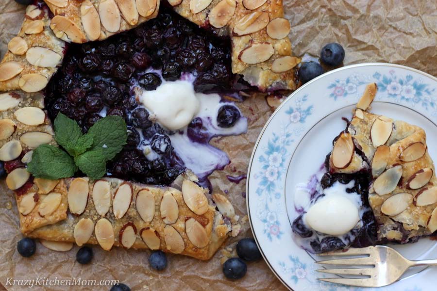 slice of blueberry galette with ice cream