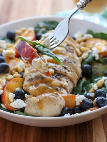Grilled Peach Chicken Salad on a fork