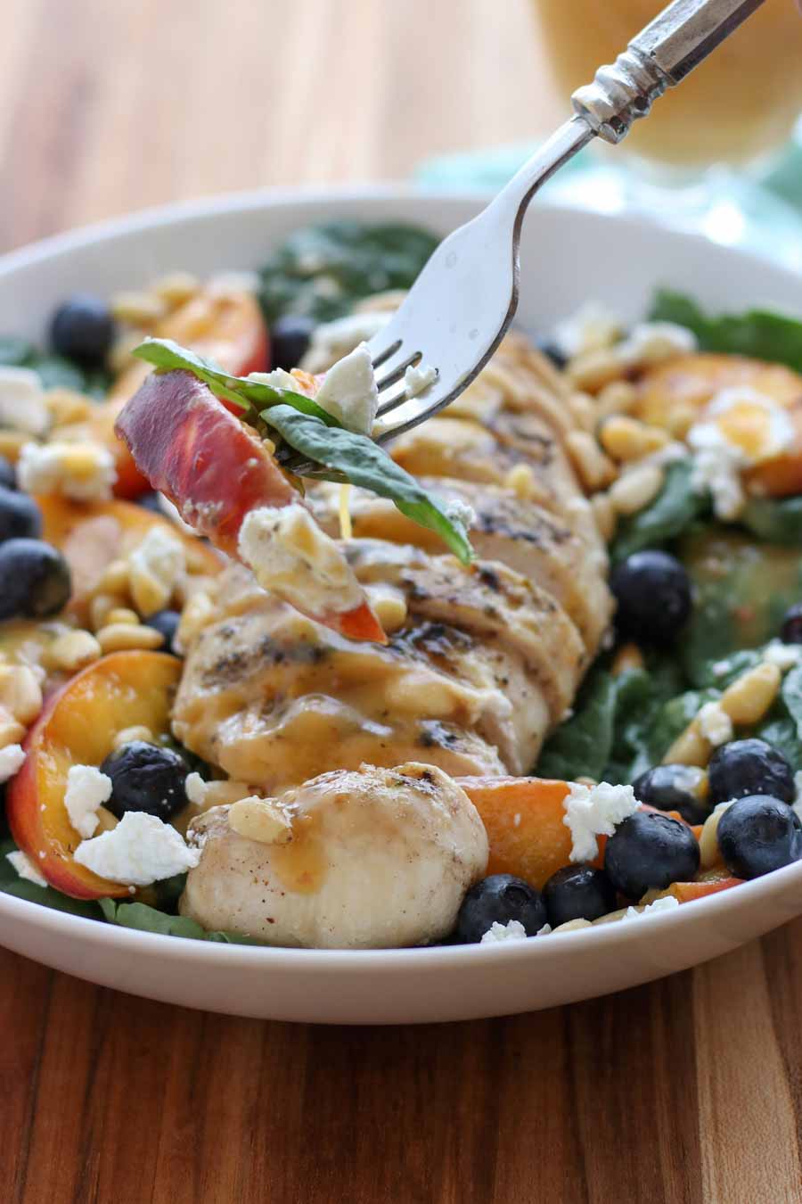 Grilled Peach Chicken Salad on a fork