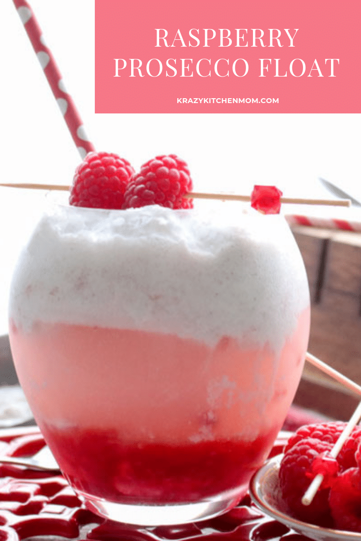 Raspberry Prosecco Ice Cream Float is a grown-up drink made with Fresh Raspberry Aperol Sauce, ice cream and bubbly prosecco. via @krazykitchenmom