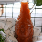 a carafe of salad dressing