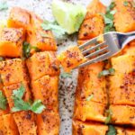 Chili Honey-Lime Roasted Sweet Potatoes with a fork