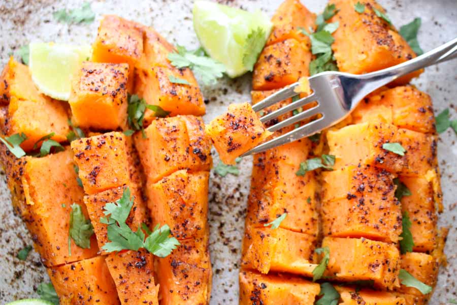 Chili Honey-Lime Roasted Sweet Potatoes with a fork