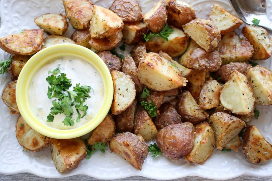 Crispy Roasted Herb Potatoes with dipping sauce