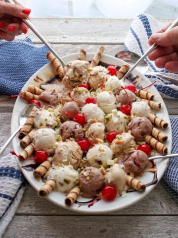 Ice Cream Party Platter with two hands holding spoons