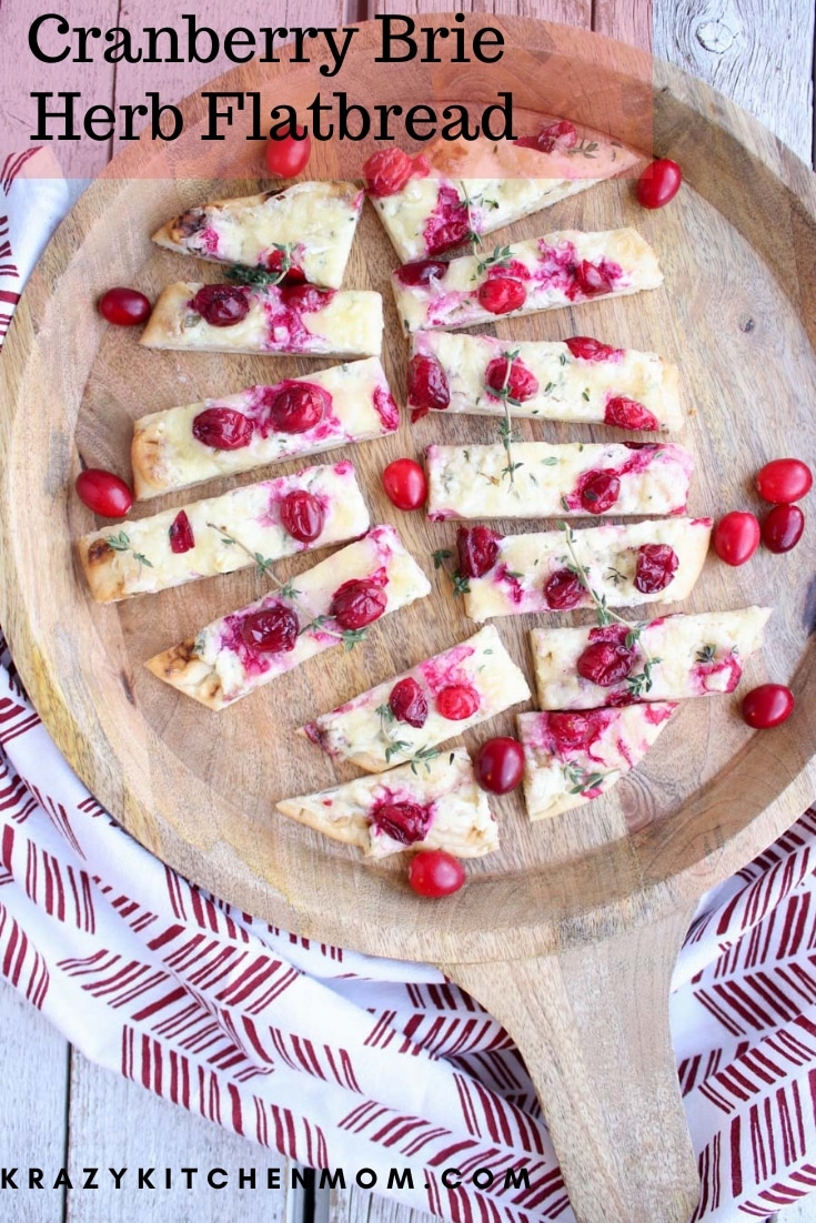 My Three Cheese Cranberry Flatbread is creamy, cheesy and a bit tart from the cranberries. It's the perfect holiday appetizer and is ready in minutes.  via @krazykitchenmom