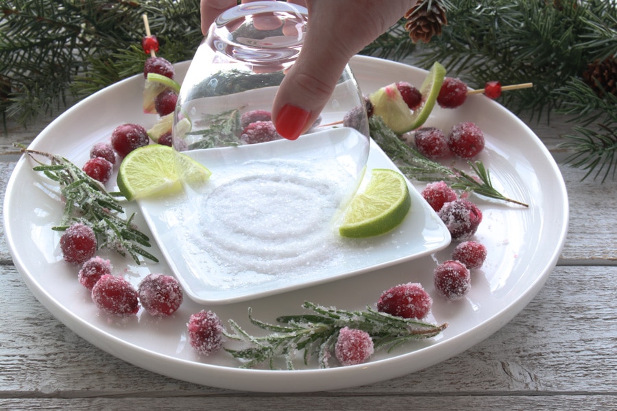 Salting the rim of the cocktail glass