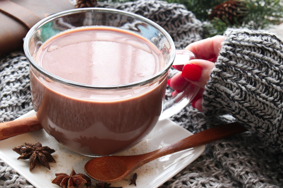 Hand holding Chai Hot Chocolate