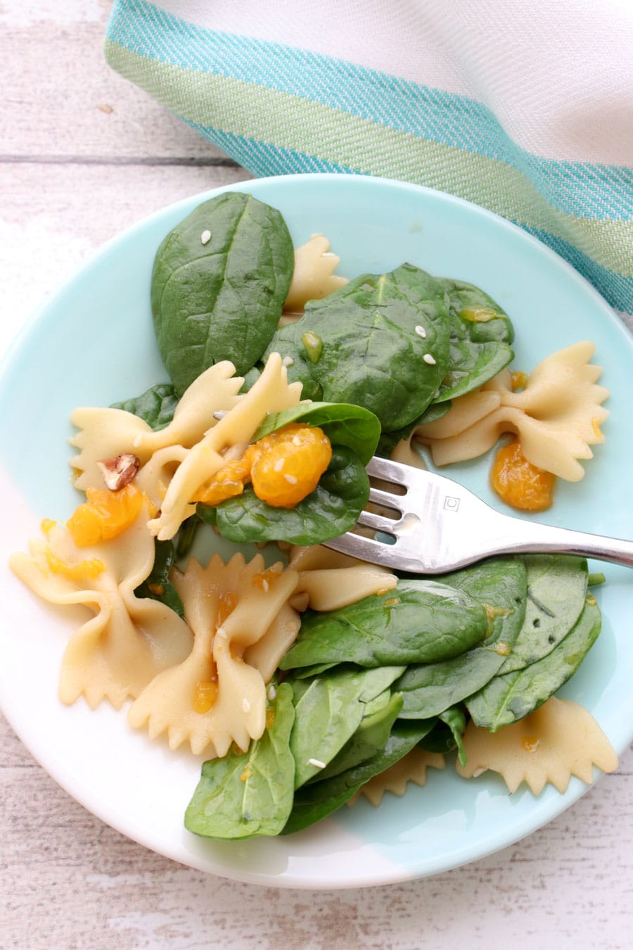 single dish of spinach pasta salad