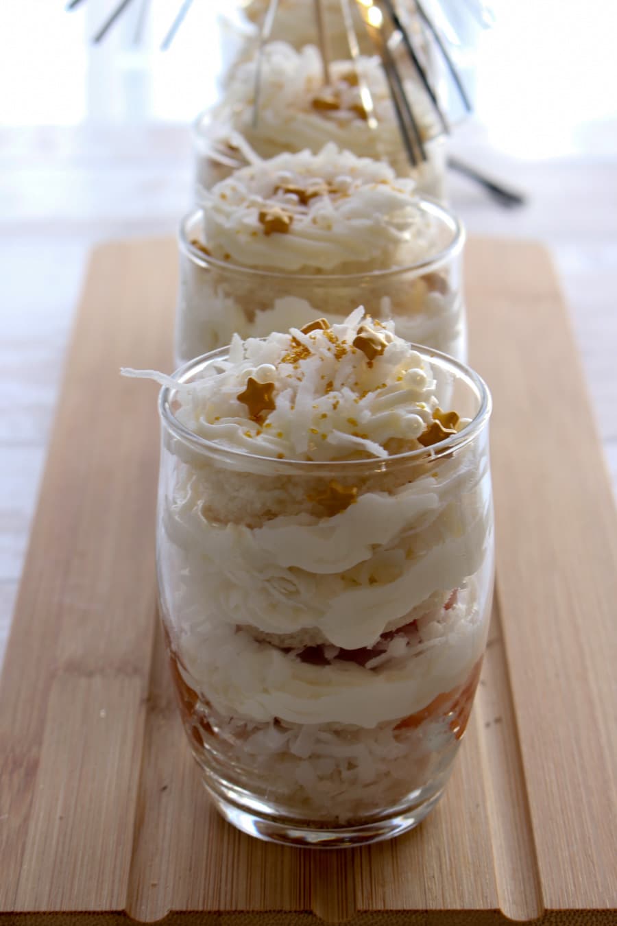 mini cake parfaits in a row