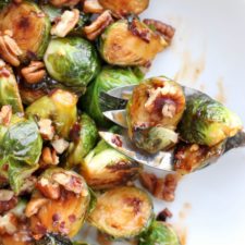 Close up shot of cooked brussel sprouts with nuts