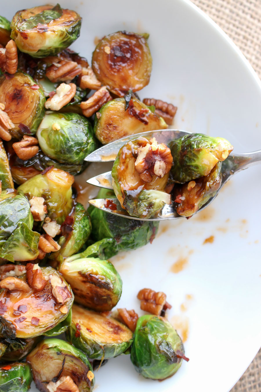 sprouts in a serving dish with a spoon