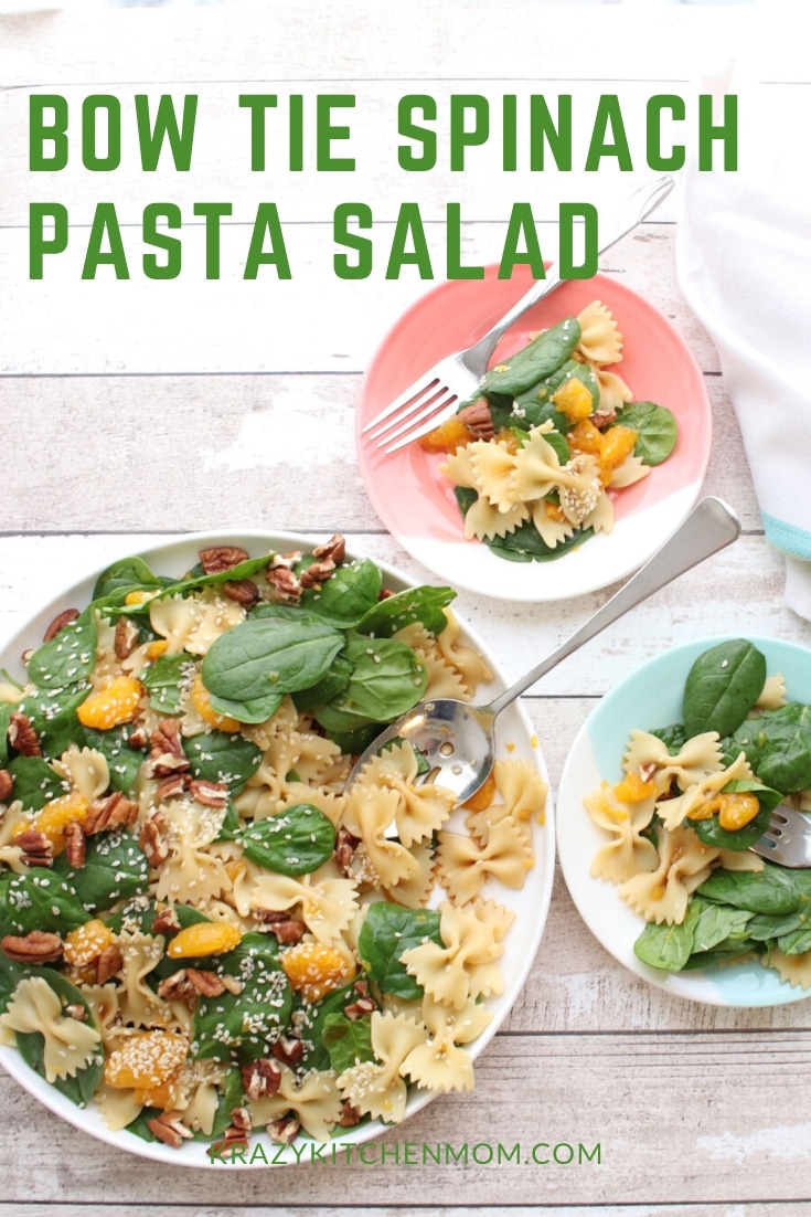 Bow Tie Spinach and Pasta Salad is made with Farfalle pasta, fresh baby spinach, mandarin oranges, and toasted walnuts with an Asian ginger dressing.  via @krazykitchenmom