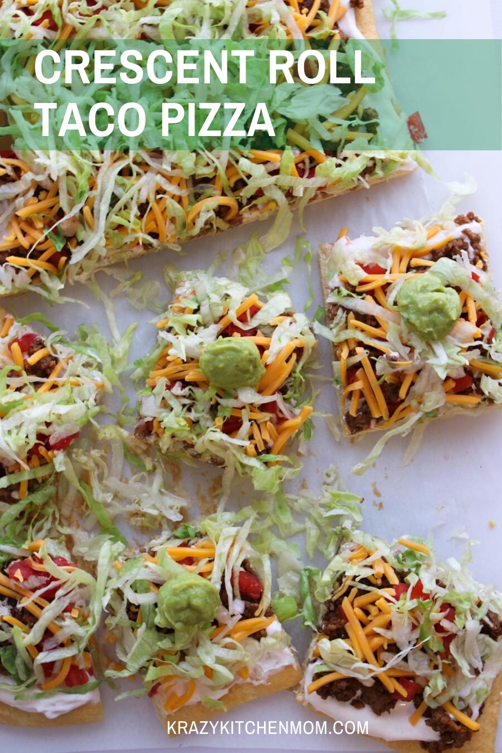 Two tubes of crescent roll dough, ground beef, taco seasoning, cream cheese, and some veggies are all you need to make Crescent Roll Taco Pizza. via @krazykitchenmom