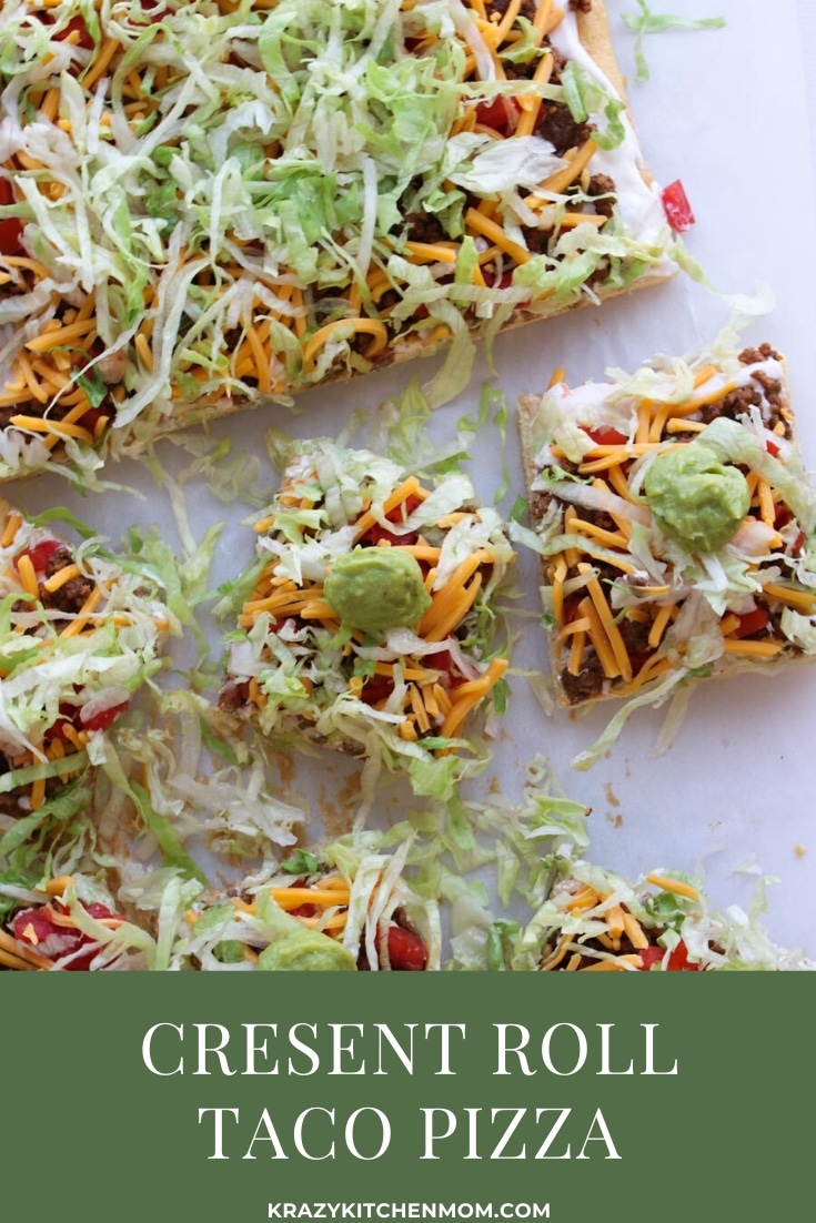 Two tubes of crescent roll dough, ground beef, taco seasoning, cream cheese, and some veggies are all you need to make Crescent Roll Taco Pizza. via @krazykitchenmom