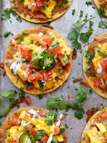 Loaded Tostadas on a cookie sheet