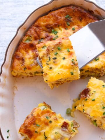 Breakfast casserole being served from platter