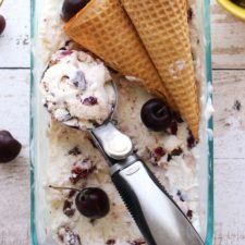 scoop of ice cream with cones in container