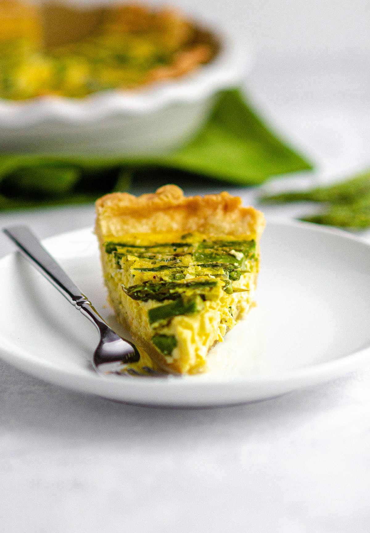 A slice of asparagus quiche