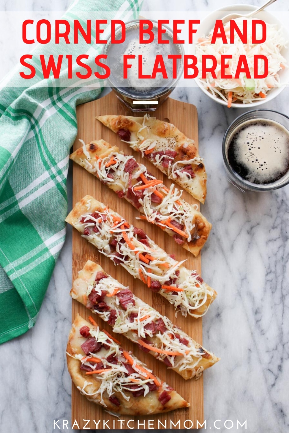 Corned Beef and Swiss Flatbread Pizza is made with leftover corned beef, naan bread, swiss cheese, topped with a cabbage and carrot coleslaw.  via @krazykitchenmom