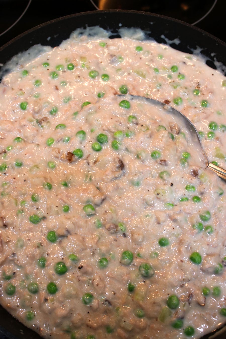 Tuna noodle sauce with peas added