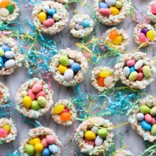 A bunch of rice krispy nests filled with candy