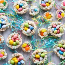 A bunch of rice krispy nests filled with candy