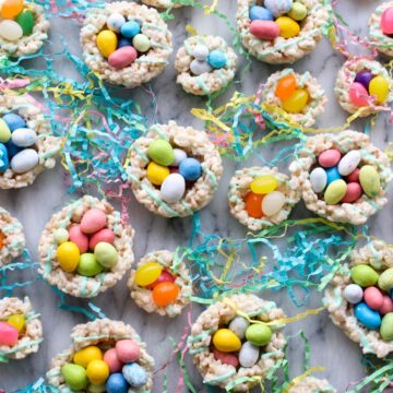 A bunch of rice krispy nests filled with candy
