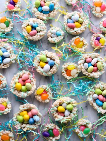 A bunch of rice krispy nests filled with candy