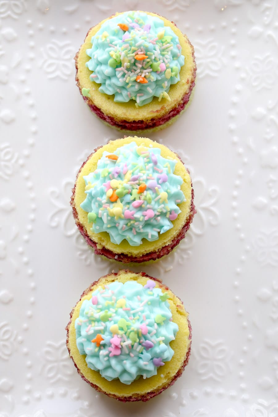 Mini layer cakes on a pretty white plate