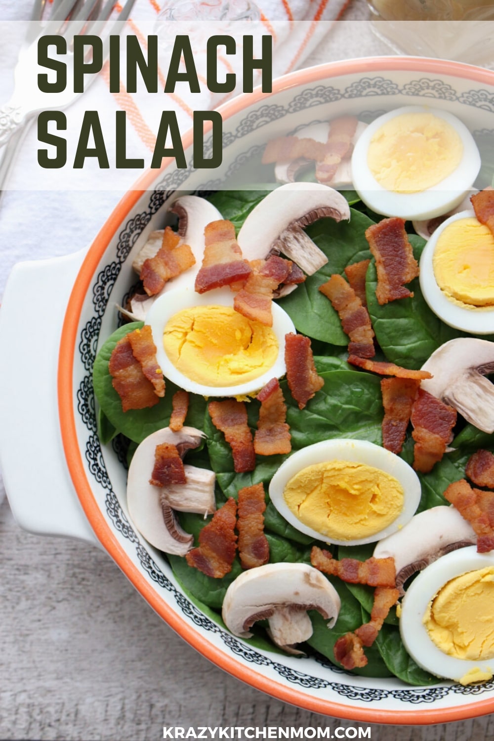 Spinach Salad with Warm Bacon Dressing is a classic salad made with a vinaigrette that uses bacon drippings instead of oil.  via @krazykitchenmom