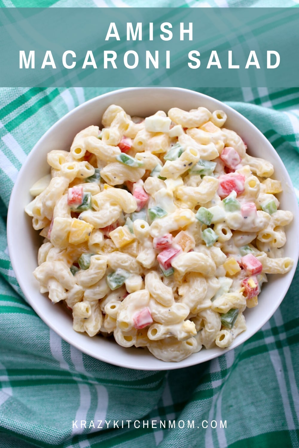 Sweet Tangy Amish Macaroni Salad is a classic summer side dish. It's full of fresh bell peppers, celery, and hard-boiled eggs. via @krazykitchenmom