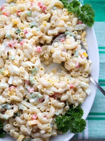 Platter of macaroni salad with a spoon