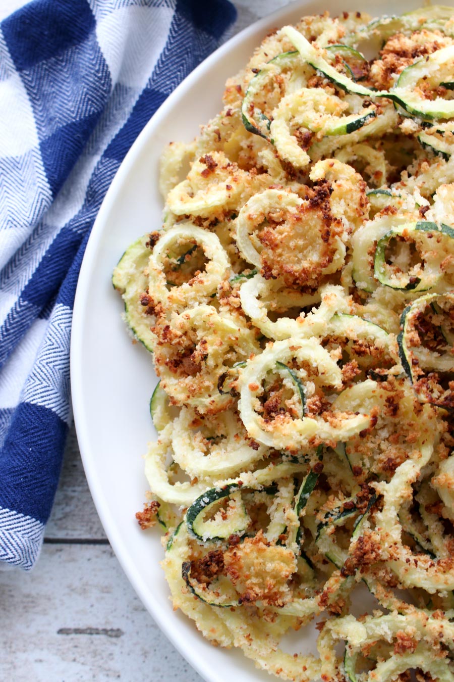 Large plate of zucchini curly fries