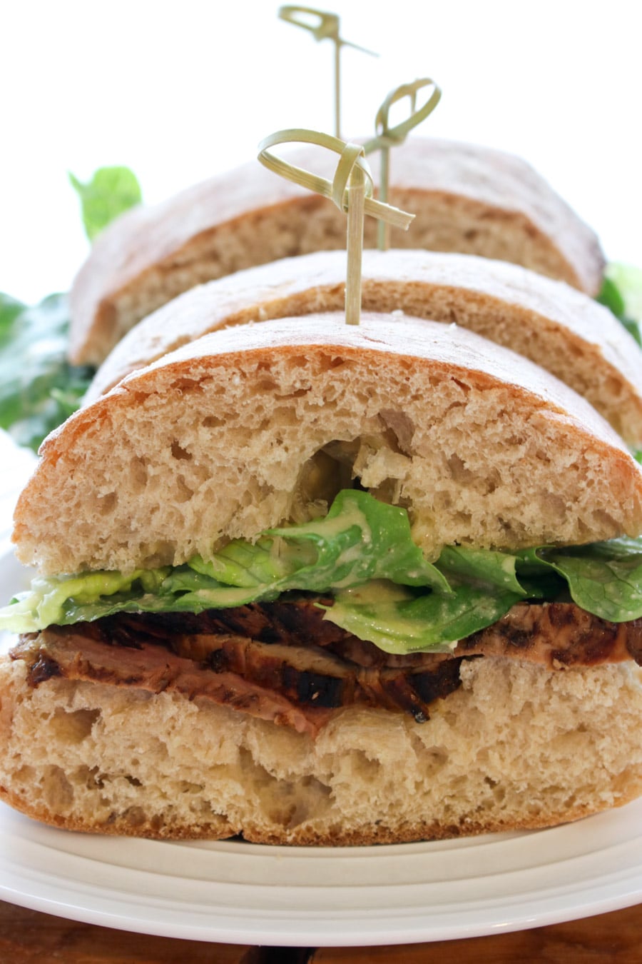 Caesar Salad Pork Tenderloin Sandwiches in a row