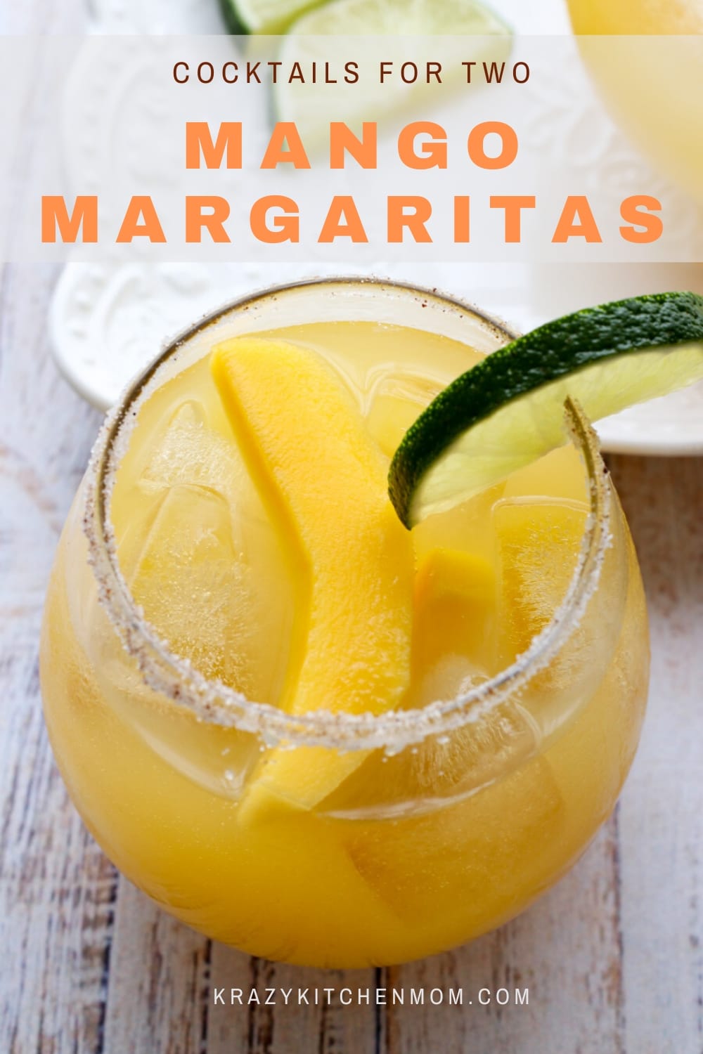 Simple Mango Margaritas are made with tequila, Cointreau, lime juice, and mango nectar. They are sweet, tangy, a  little bit spicy, and refreshing. via @krazykitchenmom