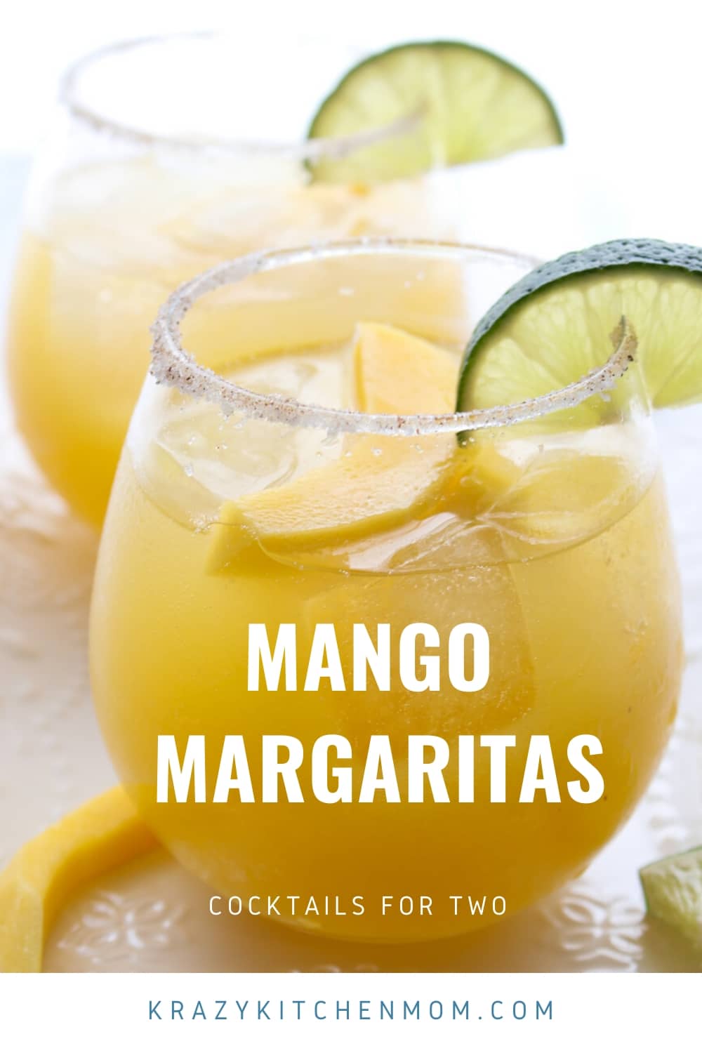 Simple Mango Margaritas are made with tequila, Cointreau, lime juice, and mango nectar. They are sweet, tangy, a  little bit spicy, and refreshing. via @krazykitchenmom