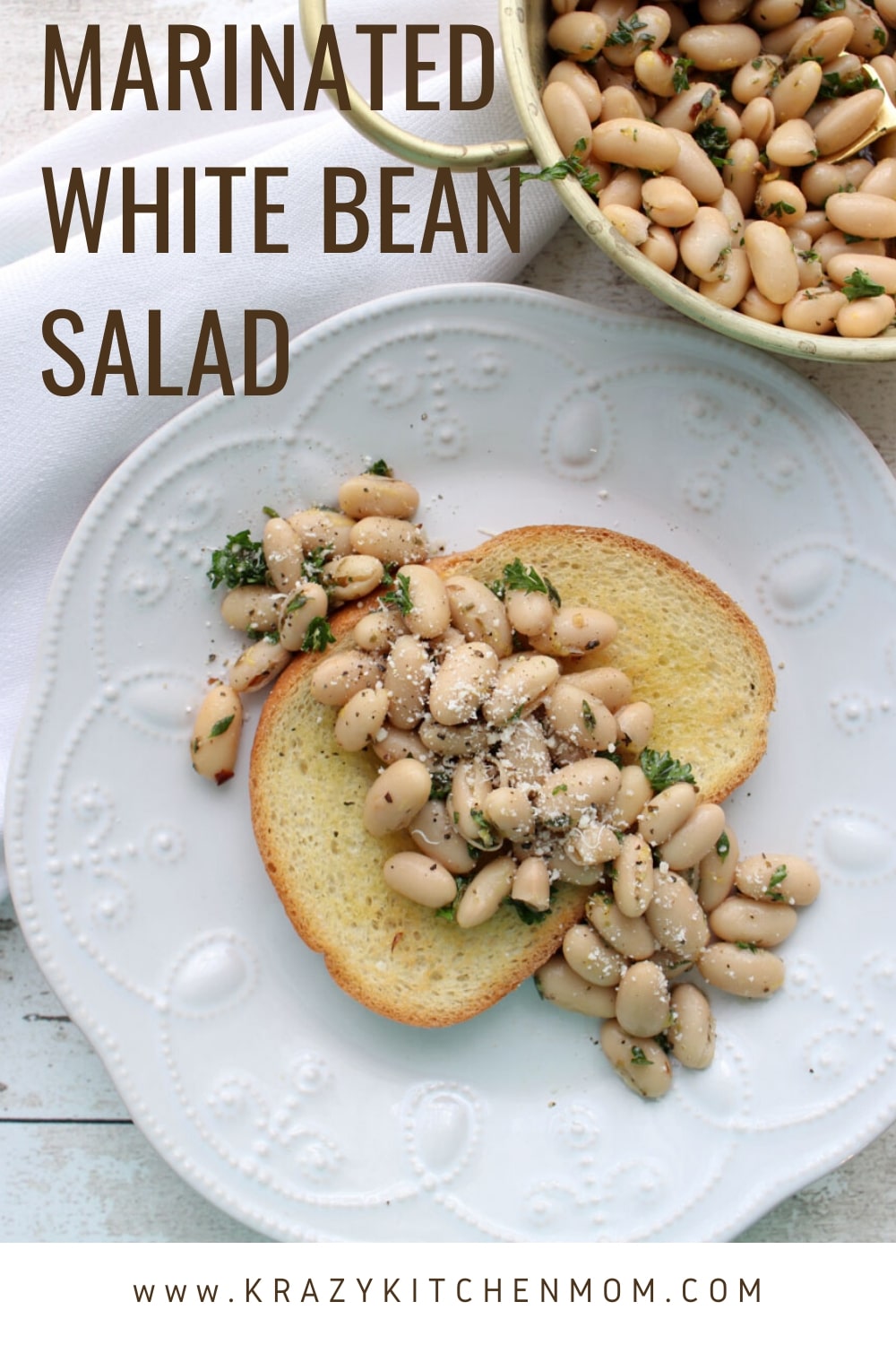 This Marinated White Bean Salad is simple and satisfying and comes together in just minutes. It's a combination of creamy white beans with fresh herbs and olive oil.  via @krazykitchenmom